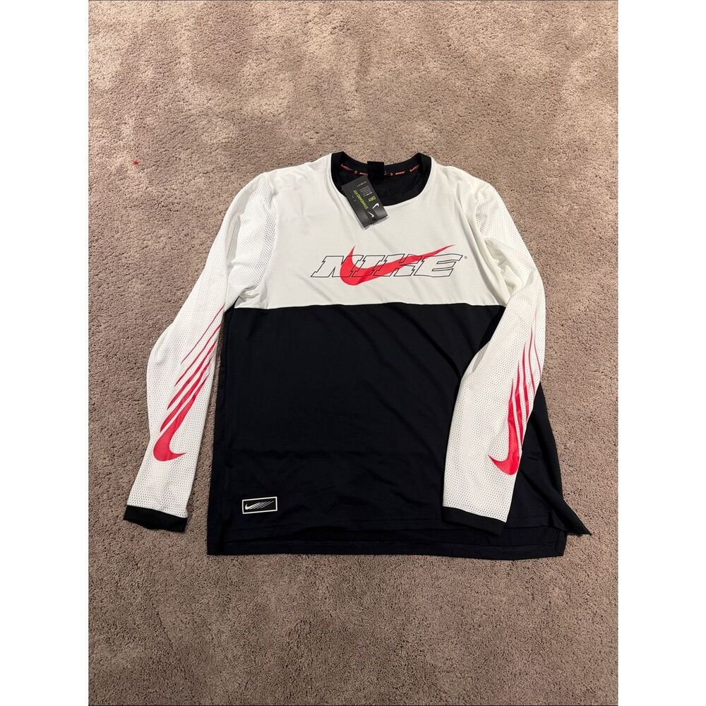 Nike Dry Fit long sleeve top! Size XL mesh sleeves and back NWT